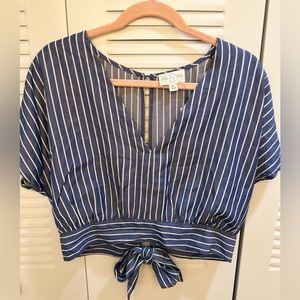 Francesca’s Jun & Ivy blue and white striped shirt with open back.
